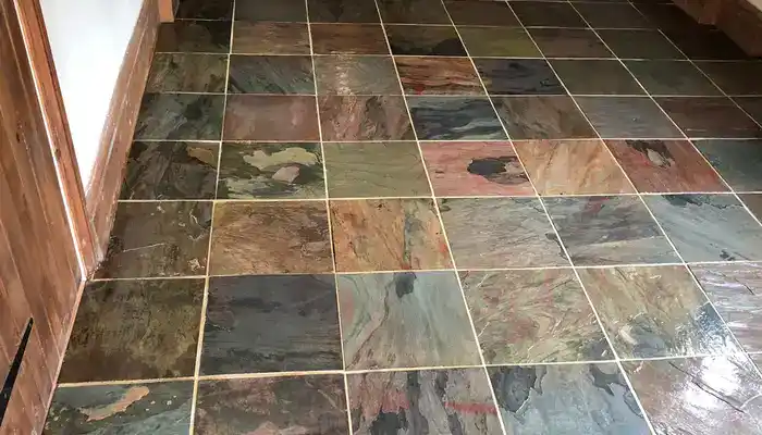 Restored slate floor with clearer colour, balanced tone, and improved surface definition